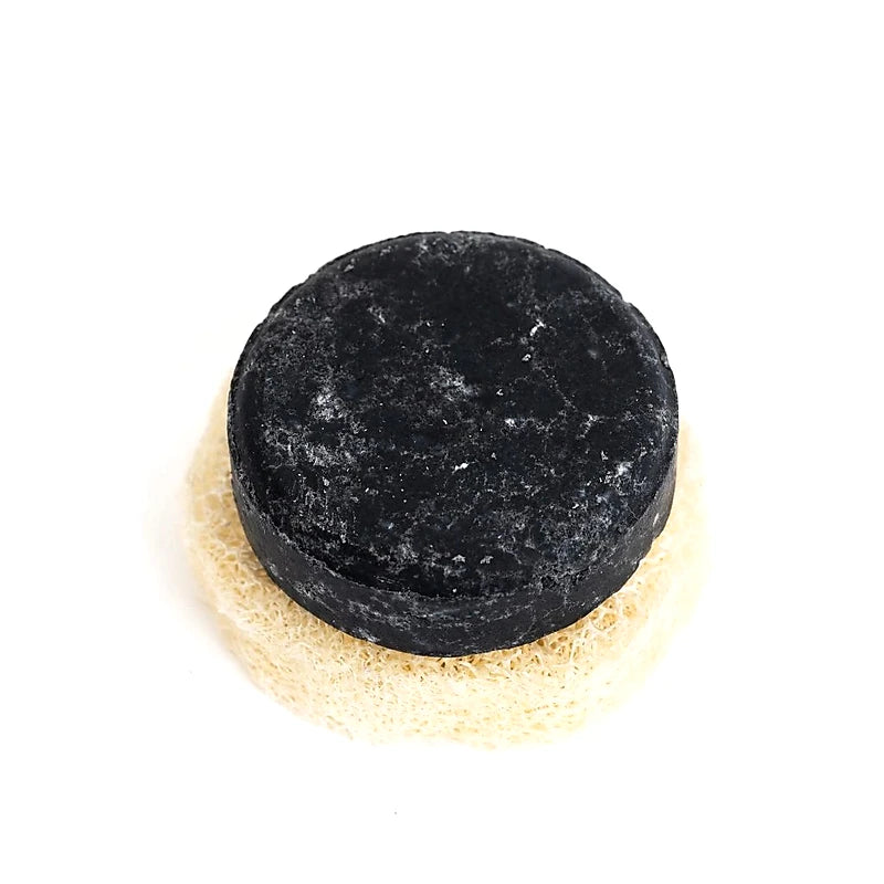 Black charcoal solid shampoo for oily hair